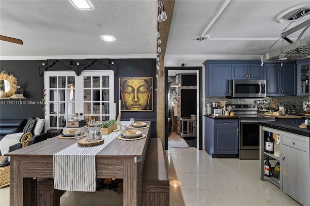 kitchen with backsplash, french doors, appliances with stainless steel finishes, and ornamental molding