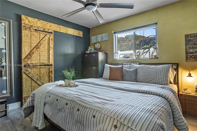 405 SW 73rd Ave, North Lauderdale, FL 33068 - bedroom featuring wood finished floors and ceiling fan