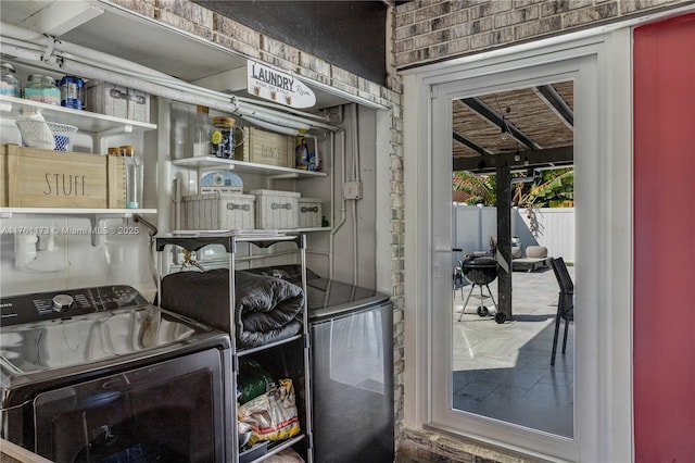 interior space featuring independent washer and dryer and laundry area