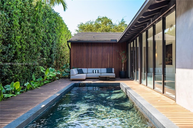 view of swimming pool with an outdoor hangout area