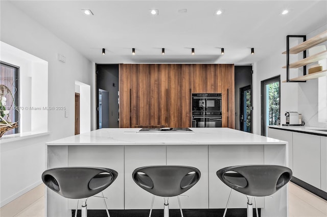 kitchen featuring black appliances, recessed lighting, white cabinetry, modern cabinets, and open shelves