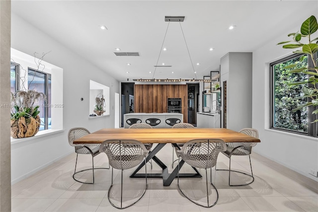 dining area featuring recessed lighting, visible vents, and light tile patterned floors