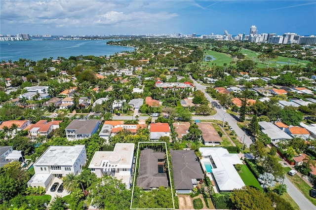 drone / aerial view with a water view and a city view