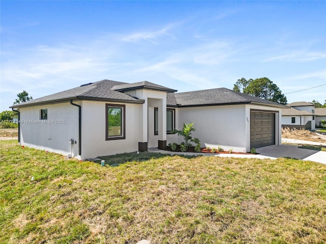 view of front of home featuring a shingled roof, a front yard, stucco siding, a garage, and driveway