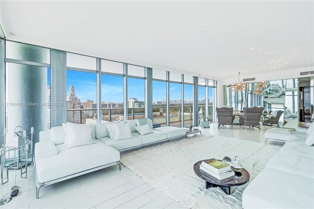 living room with a wall of windows, visible vents, and a city view