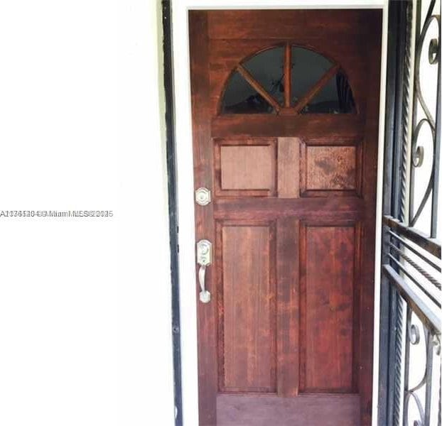 entrance to property featuring a garage