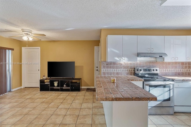 kitchen featuring electric range, under cabinet range hood, tasteful backsplash, white cabinets, and white dishwasher