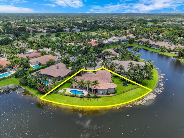 birds eye view of property featuring a water view