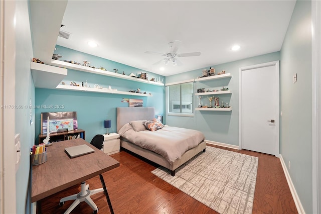 bedroom featuring recessed lighting, visible vents, baseboards, and wood finished floors