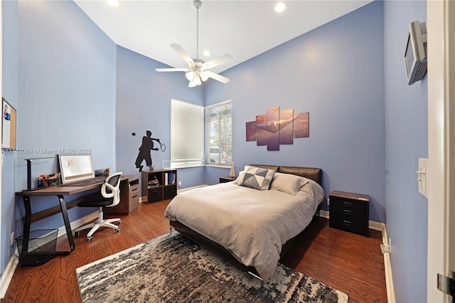 bedroom featuring recessed lighting, ceiling fan, baseboards, and wood finished floors