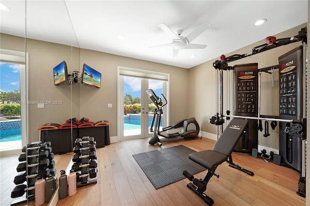 workout room featuring wood finished floors, baseboards, recessed lighting, ceiling fan, and french doors