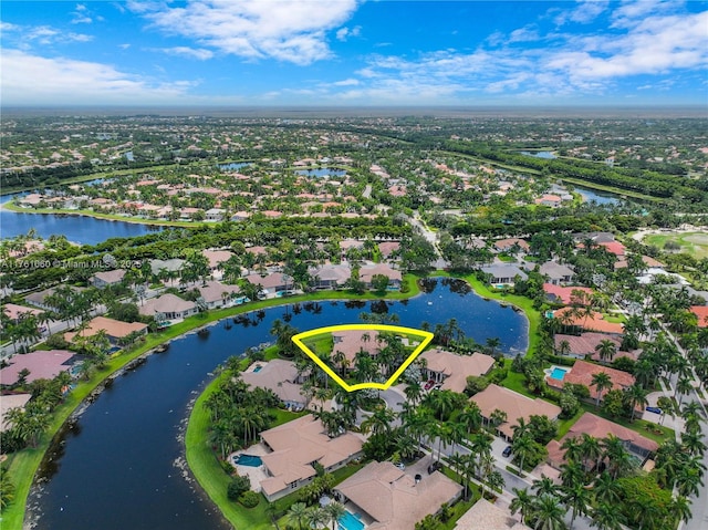 birds eye view of property featuring a residential view and a water view