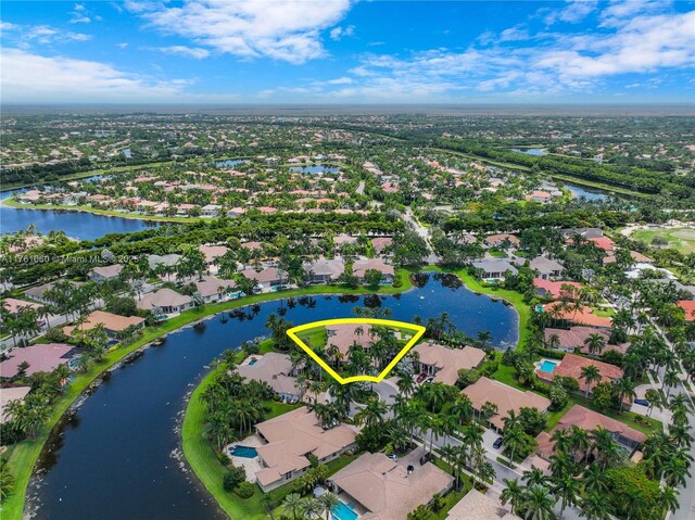 birds eye view of property featuring a residential view and a water view