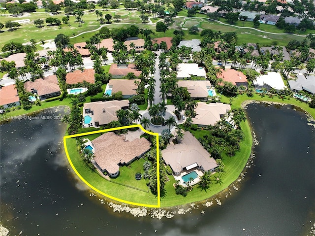 birds eye view of property featuring a residential view, golf course view, and a water view