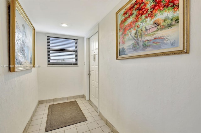 1001 Colony Point Cir Unit 514, Pembroke Pines, FL 33026 - hallway with light tile patterned floors and baseboards