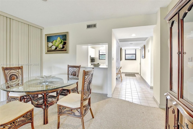 1001 Colony Point Cir Unit 514, Pembroke Pines, FL 33026 - dining area with light tile patterned floors and light carpet