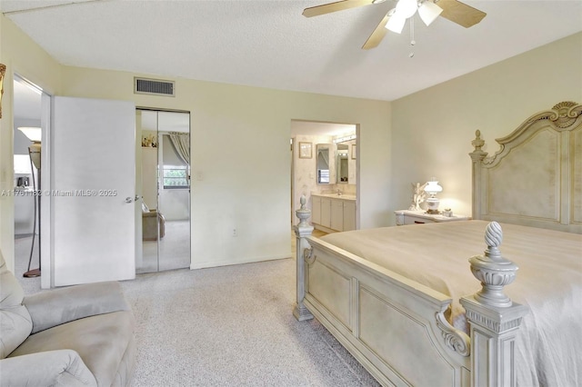 1001 Colony Point Cir Unit 514, Pembroke Pines, FL 33026 - bedroom with a closet, ensuite bath, ceiling fan, and baseboards