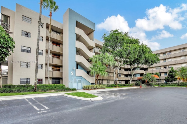 1001 Colony Point Cir Unit 514, Pembroke Pines, FL 33026 - view of apartment building / complex with uncovered parking