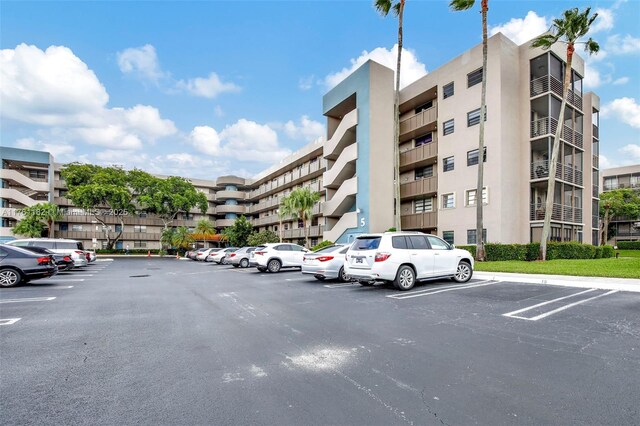 1001 Colony Point Cir Unit 514, Pembroke Pines, FL 33026 - view of apartment building / complex featuring uncovered parking