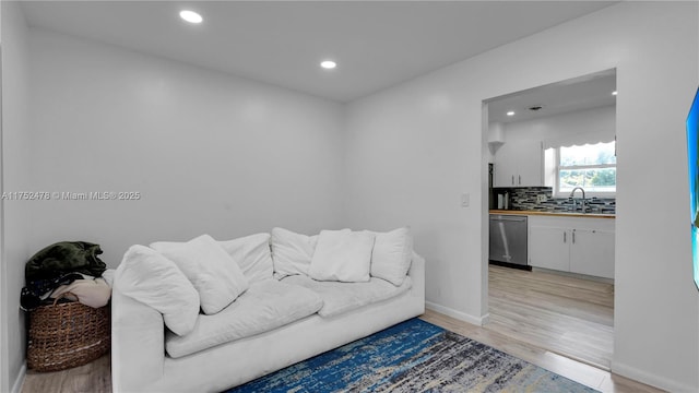 3349 W Park Rd, Hollywood, FL 33021 - living area featuring recessed lighting, light wood-type flooring, and baseboards