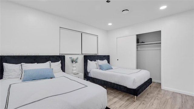 3349 W Park Rd, Hollywood, FL 33021 - bedroom featuring recessed lighting, a closet, light wood finished floors, and baseboards