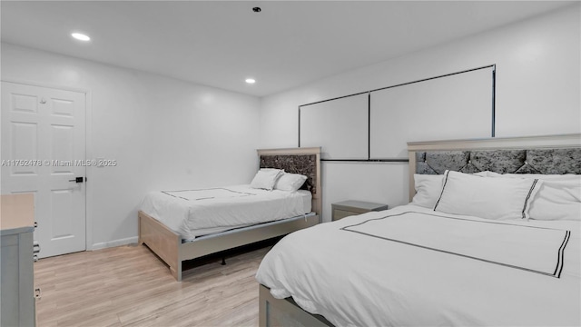 3349 W Park Rd, Hollywood, FL 33021 - bedroom featuring recessed lighting, light wood-type flooring, and baseboards