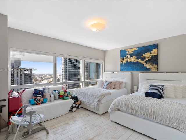 bedroom featuring wood finished floors