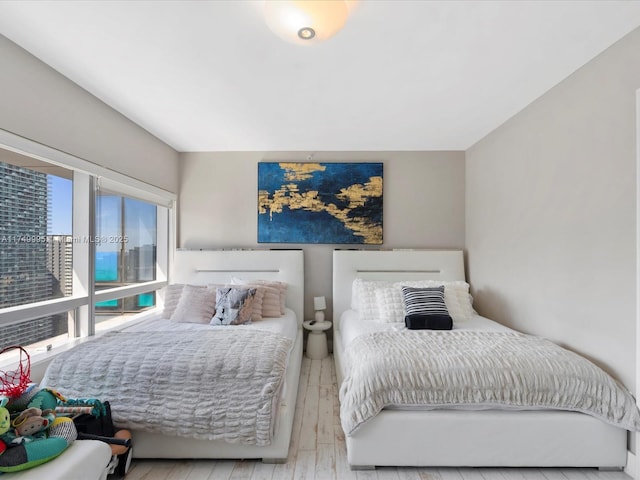 bedroom with wood finished floors