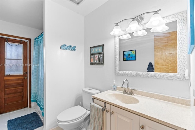 bathroom featuring tile patterned flooring, visible vents, toilet, a shower with shower curtain, and vanity