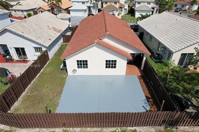 birds eye view of property with a residential view