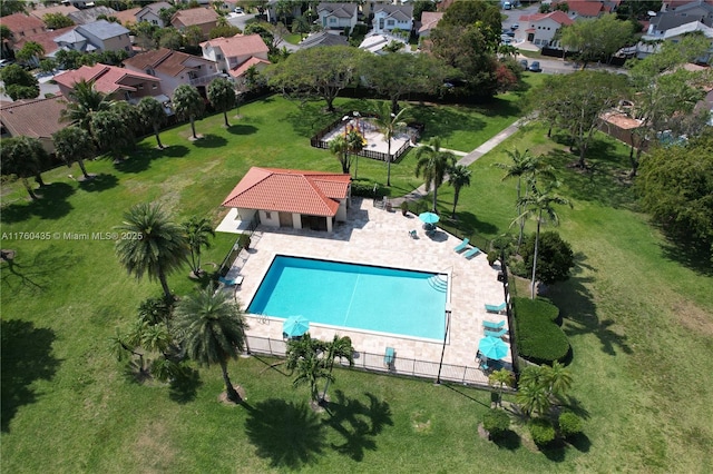 birds eye view of property with a residential view