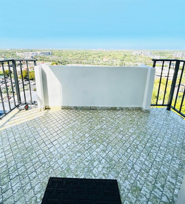 view of patio / terrace with a balcony