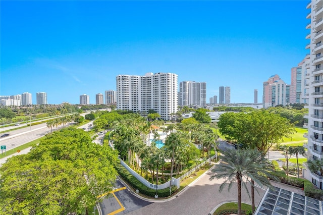 birds eye view of property with a view of city