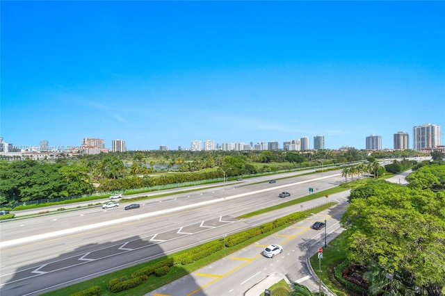 birds eye view of property with a view of city