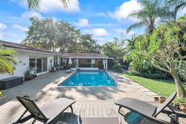 outdoor pool featuring a patio area