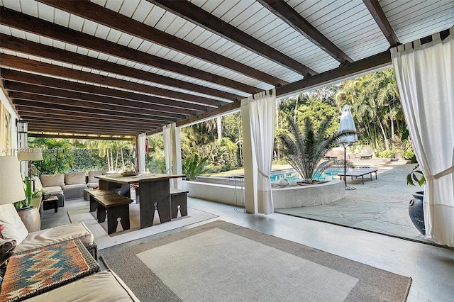 view of patio / terrace featuring outdoor lounge area and an outdoor pool