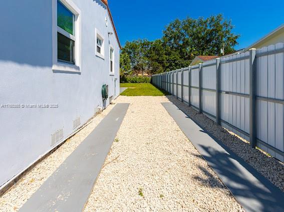 view of yard featuring fence