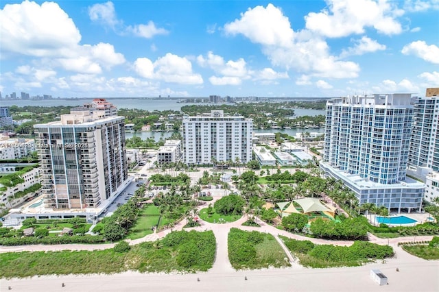 aerial view featuring a view of city and a water view