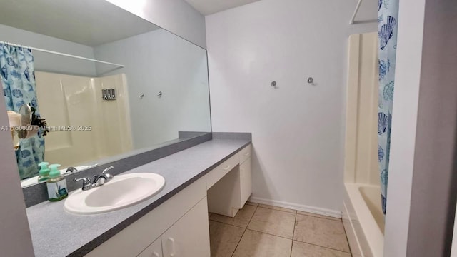 full bathroom with vanity, tile patterned floors, shower / bathtub combination with curtain, and baseboards