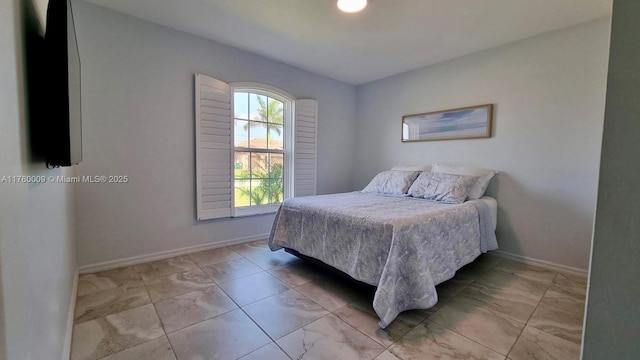 bedroom with baseboards