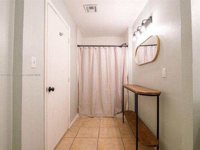 1735 18th St, Vero Beach, FL 32960 - bathroom featuring tile patterned flooring and a shower with shower curtain