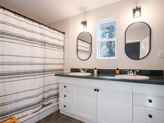 1735 18th St, Vero Beach, FL 32960 - bathroom with double vanity, tile patterned flooring, and a shower with shower curtain