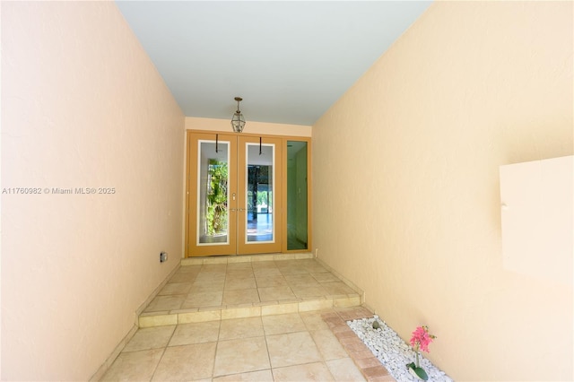 entrance to property featuring french doors