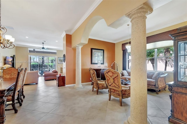 interior space with light tile patterned floors, decorative columns, and crown molding