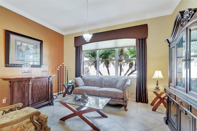 living area with light tile patterned floors, a chandelier, and ornamental molding