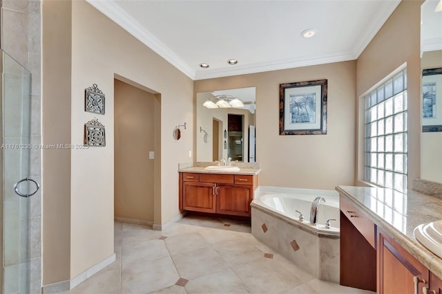 full bath featuring a sink, crown molding, tile patterned flooring, baseboards, and a bath