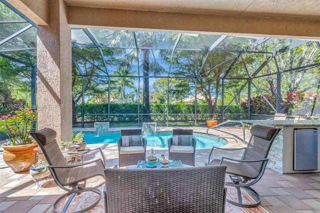 view of patio with a lanai and a fenced in pool