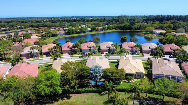 bird's eye view featuring a residential view and a water view