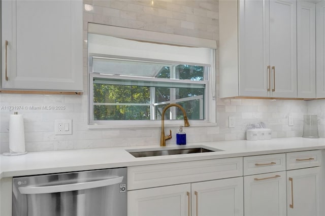 kitchen with a sink, decorative backsplash, dishwasher, and light countertops