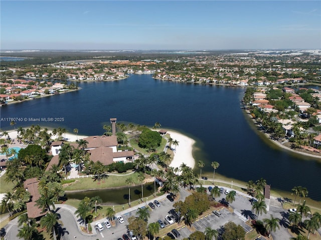 drone / aerial view with a water view